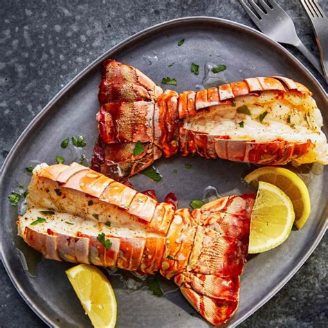 Dec 26, 2023 · Season lobster tails generously with salt and pepper. Heat 2 tablespoons butter and oil in a pan or skillet over medium-high heat. Swirl in 1 tablespoon of lemon juice and sear lobster, flesh side down on the pan, for 2 minutes until edges are crisp and golden. Flip all tails, cover pan and let cook for a further 1-2 minutes, or until shells ... 